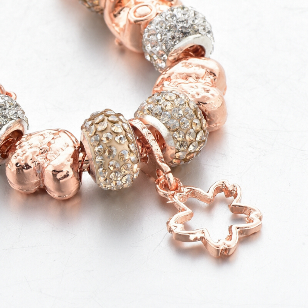 Rose gold charm 2025 on silver bracelet
